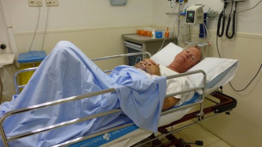 photo of tom in hospital bed