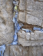 prayers stuffed in western wall